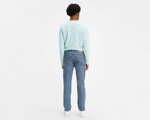 Load image into Gallery viewer, The original blue jean since 1873. The original straight fit jean. All-American style.   100% Cotton Non stretch denim Button Fly 5-pocket styling Wash your jeans once every 10 wears at most; this increases their lifespan and saves natural resources When you eventually launder your jeans, wash and dry them inside out with like colors; liquid detergent is recommended  Medium Stonewash